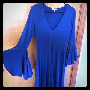 Fun blue knee-length dress with bell sleeves